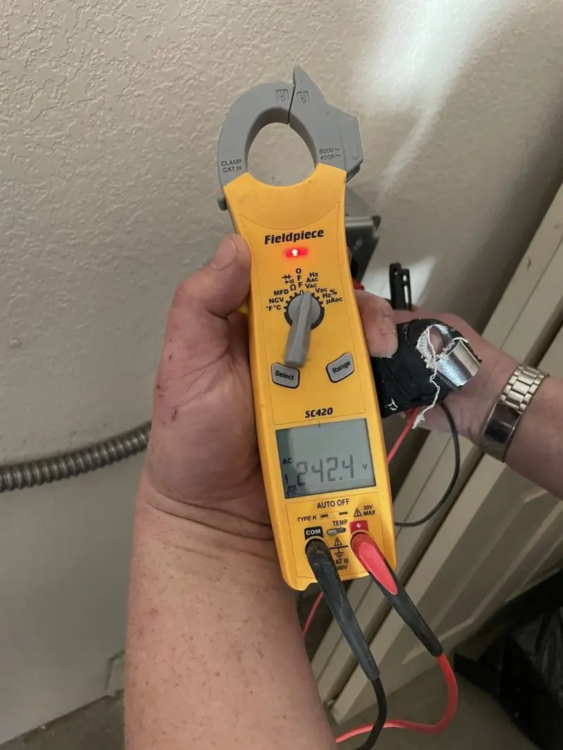 Voltage testing with clamp meter during Electrical Installation Services in Shiloh